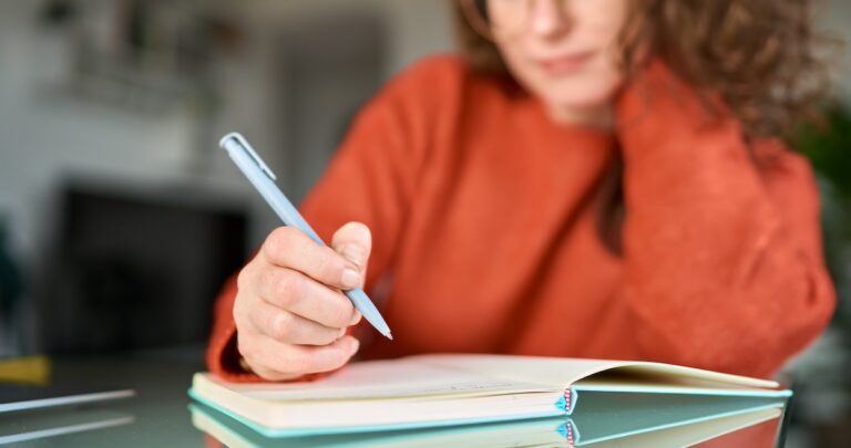 Best script ideas: image of a scriptwriter jotting down ideas for a script