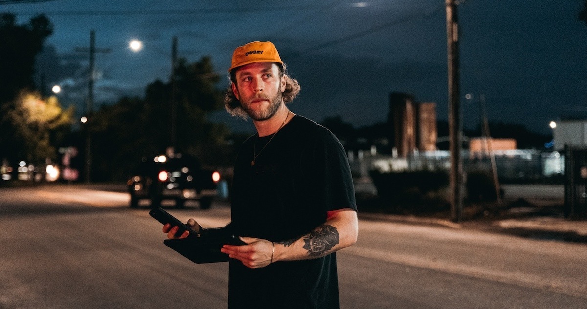 Documentary producer: image of a documentary producer watching a shoot in progress