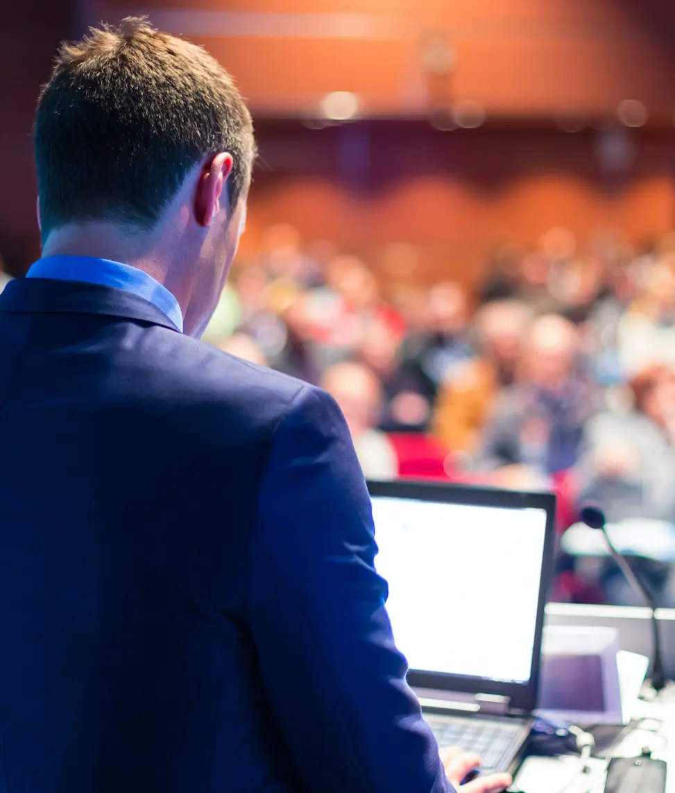 Business presentation scripts: Image of man giving a business presentation