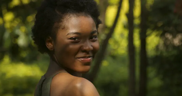 Smiling woman in black tank top